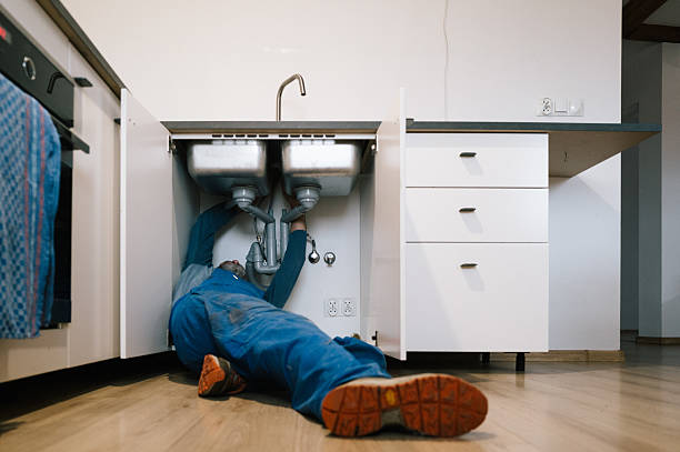 Professional Emergency Plumber technician working in Sagamore, MA